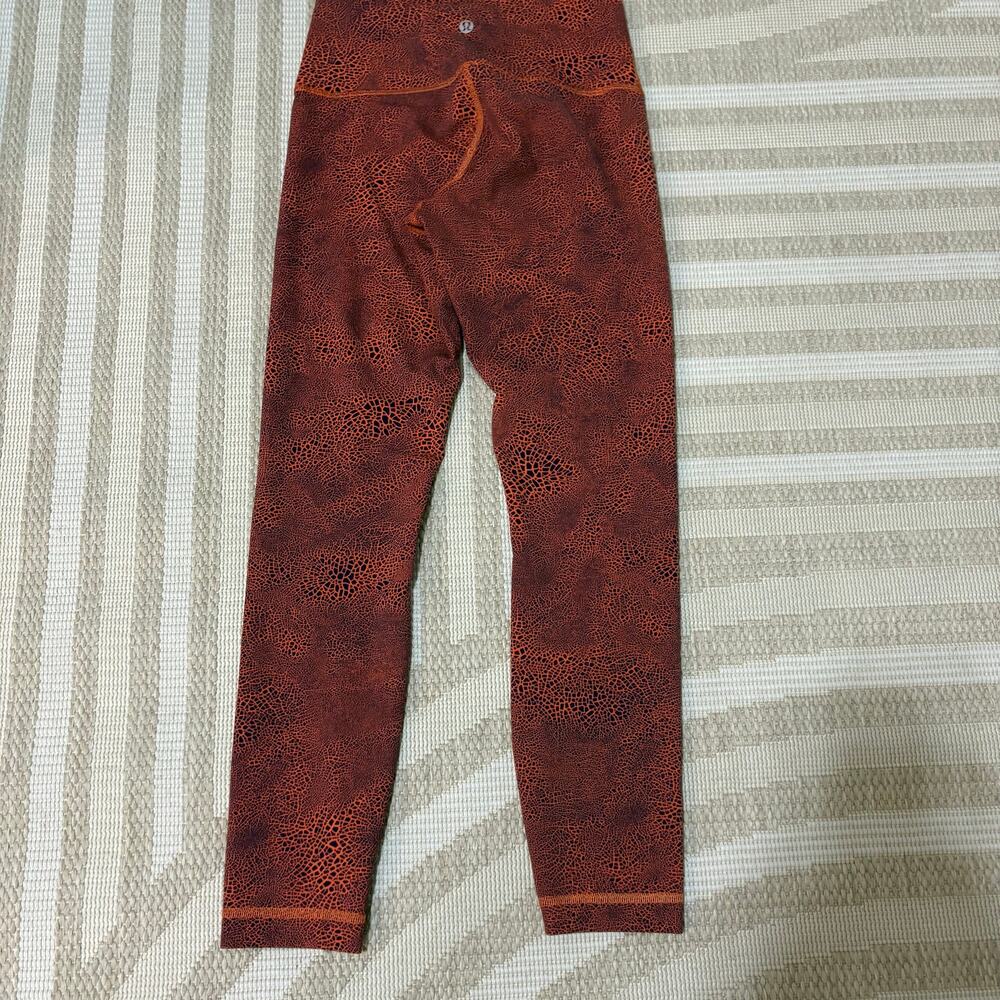 Lululemon Athletica Leggings Size 6 Orange and Black Boho